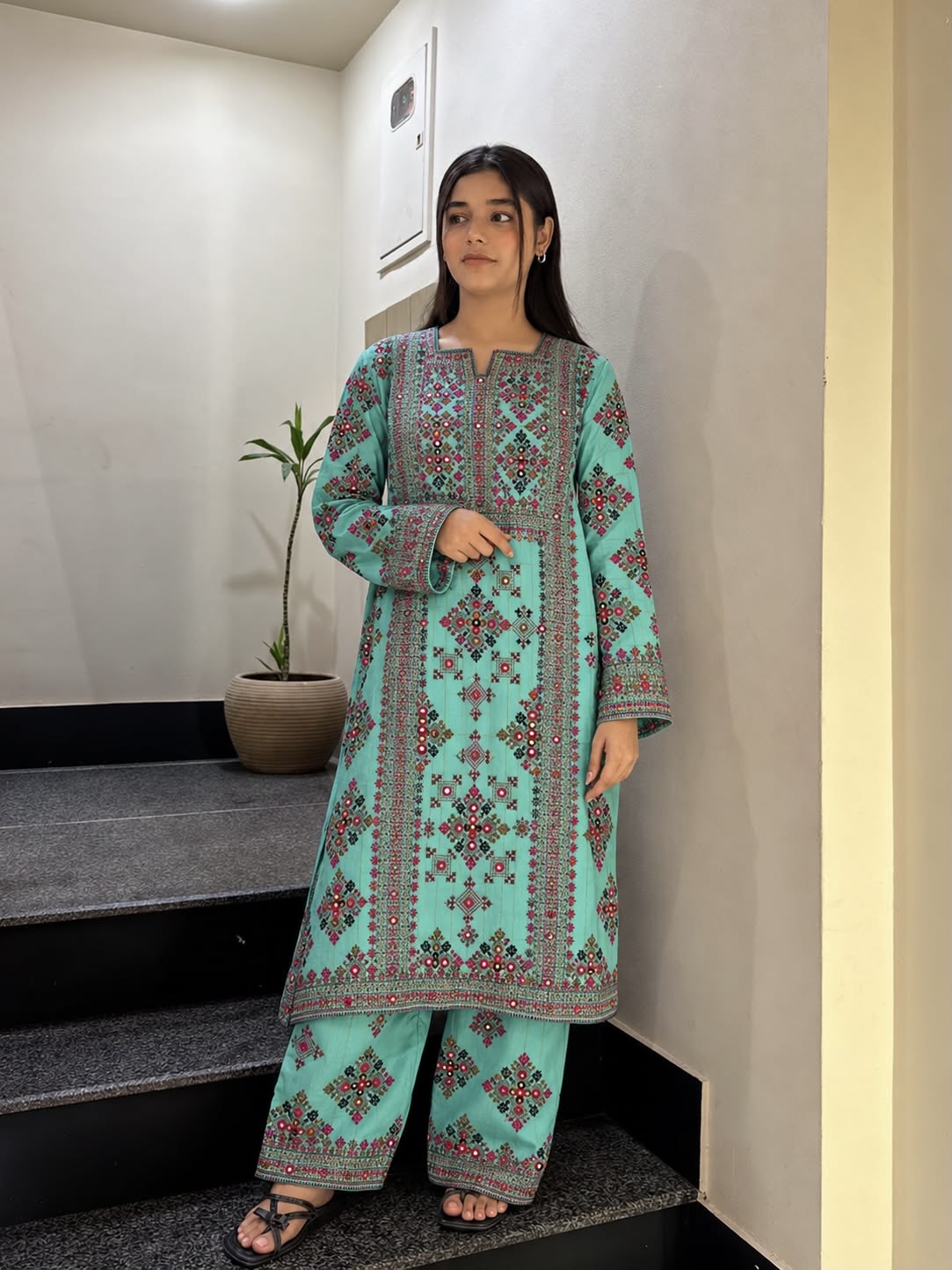 Black and red Balochi suit